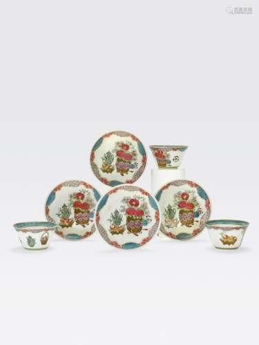 A SET OF THREE FAMILLE ROSE ENAMELED CUPS ANDFOUR SAUCERS