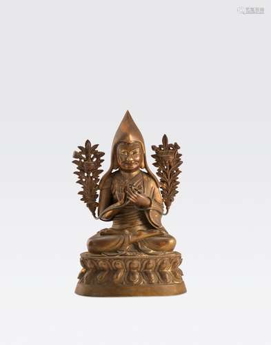 A GILT METAL ALLOY FIGURE OF TSONGKAPA