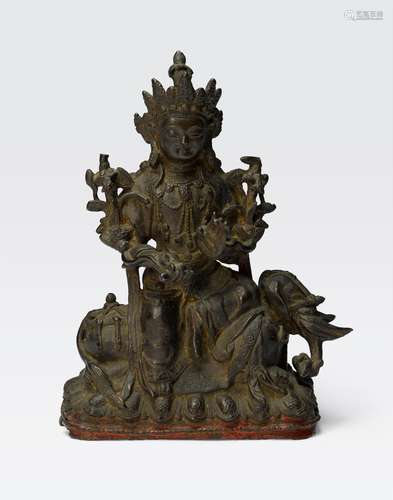 A CAST BRONZE FIGURE OF PUXIAN