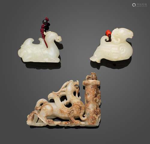 A GROUP OF THREE ARCHAISTIC JADE CARVED ANIMALS