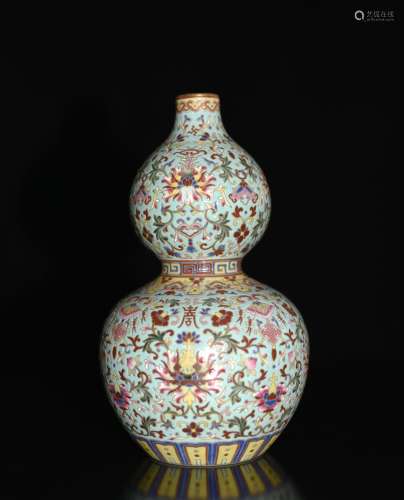 A FAMILLE ROSE DOUBLE GOURD VASE, QIANLONG SIX-CHARACTER MARK
