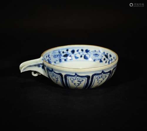 A BLUE AND WHITE VESSEL