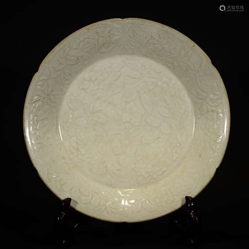 A DING YAO CARVED PETAL-FORM PLATE