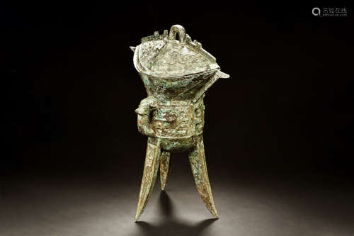 ARCHAIC BRONZE CAST RITUAL VESSEL, JIAO