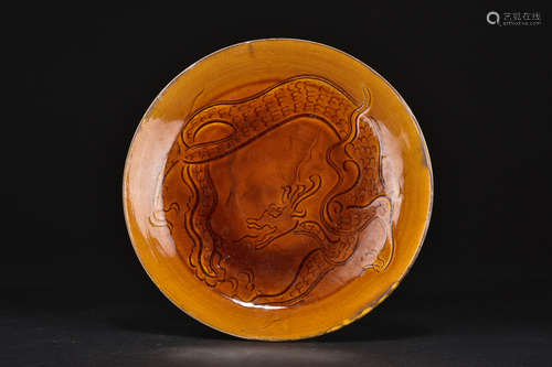 ORANGE-RED GLAZED 'DRAGON' CHARGER