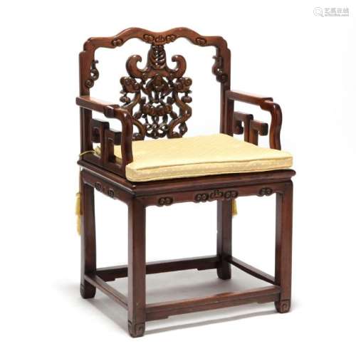 A Chinese Carved Wooden Chair