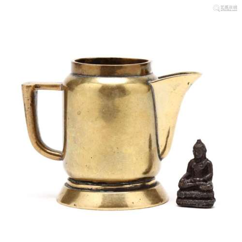 A Chinese Brass Measure and Bronze Buddha Devotional