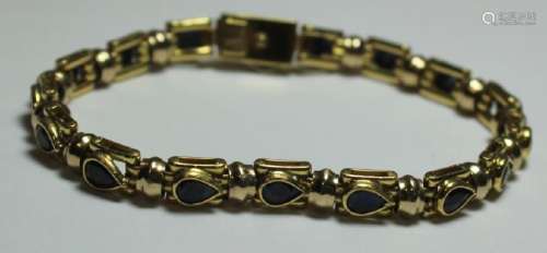 JEWELRY. Signed 18kt Gold and Sapphire Bracelet.