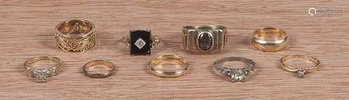 Group of nine rings, to include a 14K yellow gold