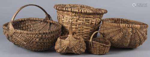 Five woven baskets.