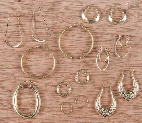 Seven pairs of 14K marked hoop earrings, together