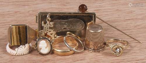 Group of gold and gold plated jewelry, to include