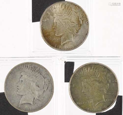 Three silver Peace dollars, to include 1923 S, 19