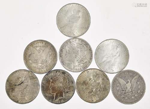 Eight silver dollars, to include three Morgan and