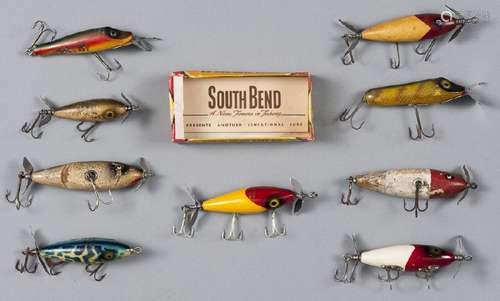 Nine South Bend wood fishing lures, to include fi