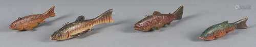 Four carved and painted fish decoys, mid 20th c.,