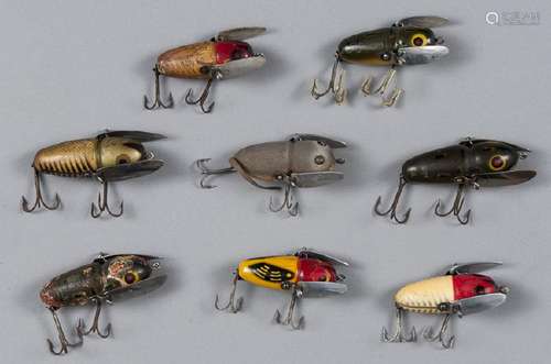 Eight Heddon crazy crawler wood fishing lures, to