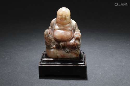 A Chinese Soapstone Curved Happy Buddha Statue