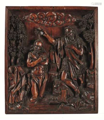 Panneau rectangulaire en noyer sculpté (trois planches) représentant Le baptême du Christ dans le Jourdain.