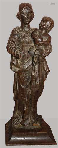 Statuette en bois représentant la Vierge à l'Enfant.