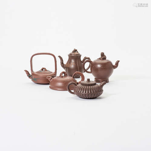 A collection of five Chinese Yixing teapots and covers