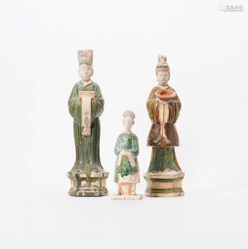 Two large and a small Chinese sancai-glazed earthenware figures