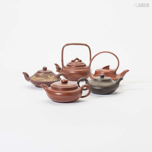 A collection of five Chinese Yixing teapots and covers