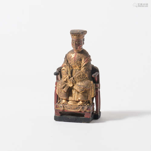 A Chinese lacquer and gilt wood figure of Xiwangmu