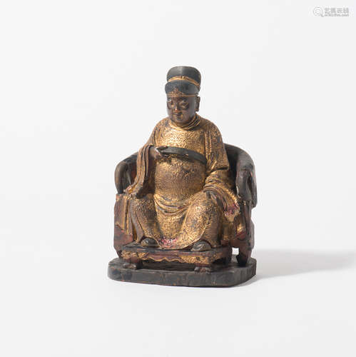 A Chinese lacquer and gilt wood figure of Guandi