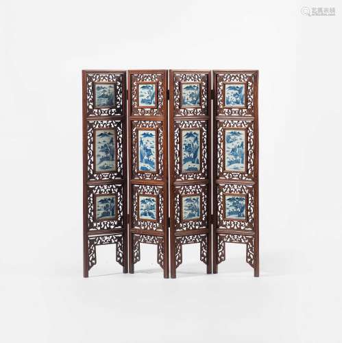 A Chinese wooden four-panelled screen