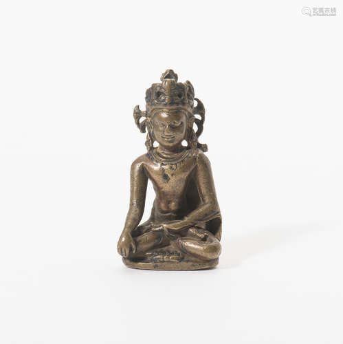 A Tibetan bronze figure of Buddha