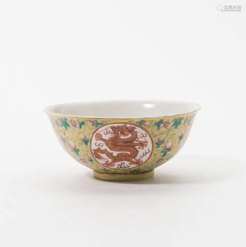 A Chinese famille rose yellow-ground 'dragon and phoenix' bowl