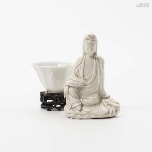 A Chinese blanc-de-chine figure of Guanyin and a blanc-de-chine cup