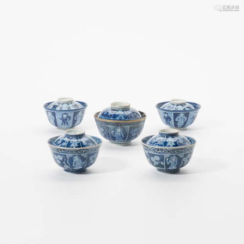 Five Japanse blue and white 'Namban ware' rice bowls and covers