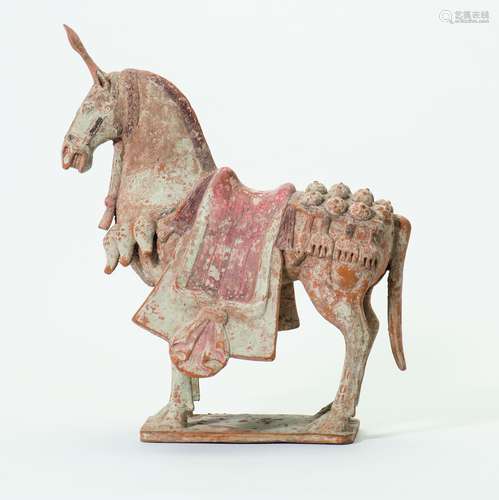 A Chinese polychrome painted pottery figure of a caparisoned horse