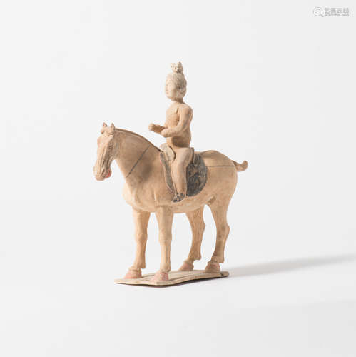 A Chinese pottery model of an equestrian lady