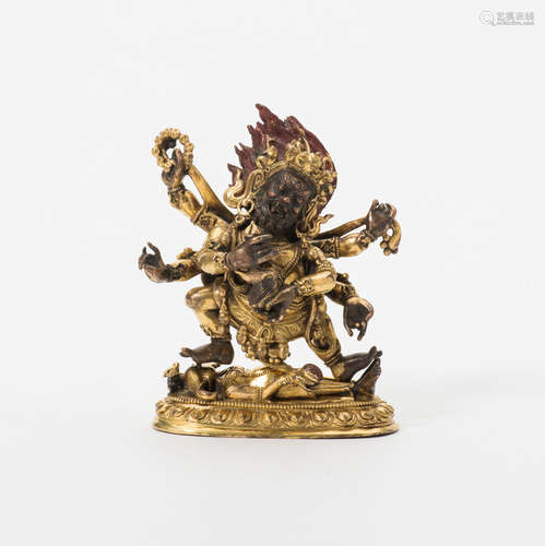 A Tibetan gilt-bronze figure of Sadbhujamahakala