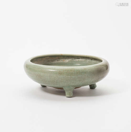 A Chinese celadon tripod censer