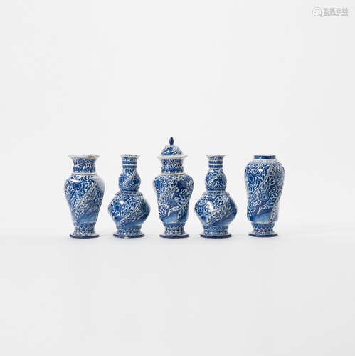 A Dutch Delft blue and white earthenware chinoiserie five-part garniture