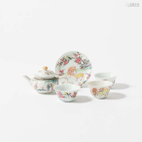 A Chinese famille rose teapot and cover, three teabowls and a saucer