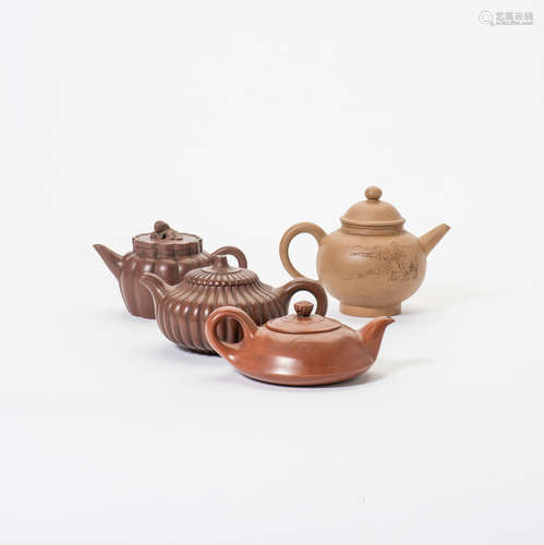 A collection of four Chinese Yixing teapots and covers