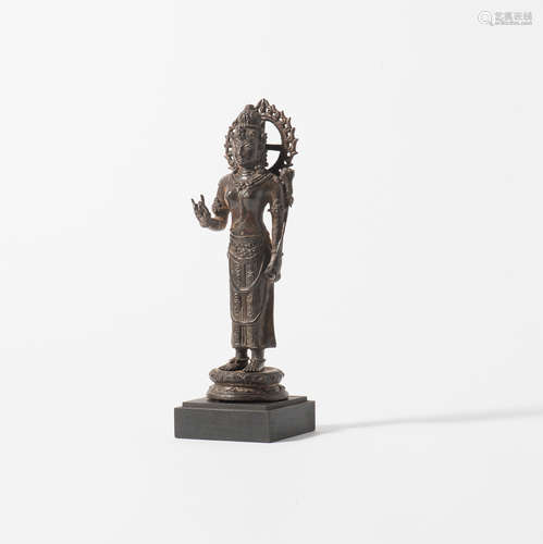 An Indonesian metal figure of Avalokiteshvara