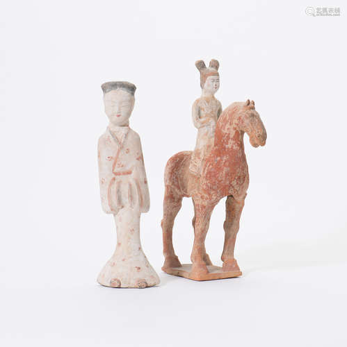 A Chinese earthenware of a lady on horseback and a sculpture of a dancer