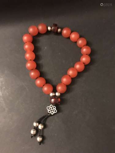 Qing D., A Chamilia Beads and Amber Bracelet