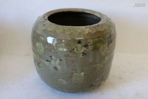 Asian Green Pottery Jar with carved design