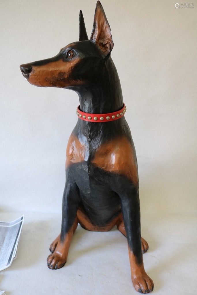 doberman stone statue