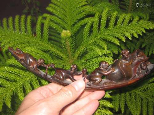 Chinese antique carved bull horn: 4 monkeys & fruit