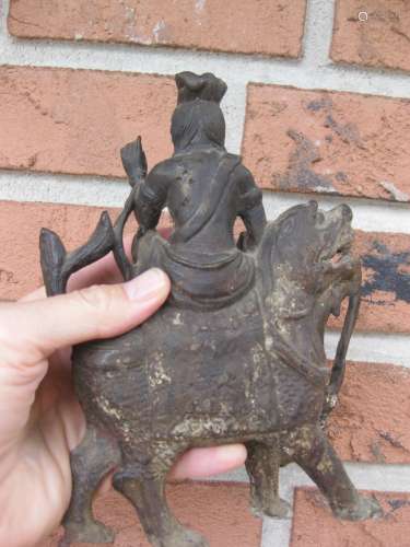 Chinese Ming Dynasty figure of a Guan Yin on the beast, 8”;