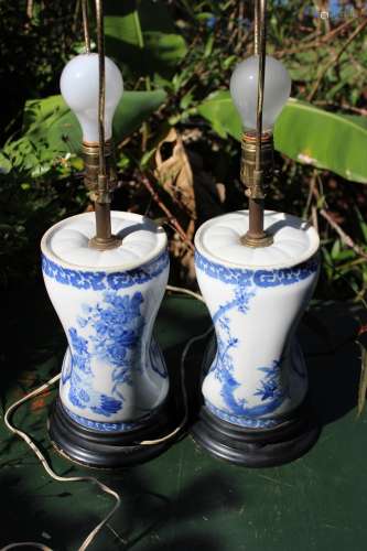 Pair of antique Chinese porcelain monk pillows, designed as lamps;