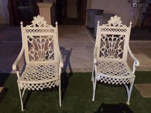 Two White Cast Iron Chairs